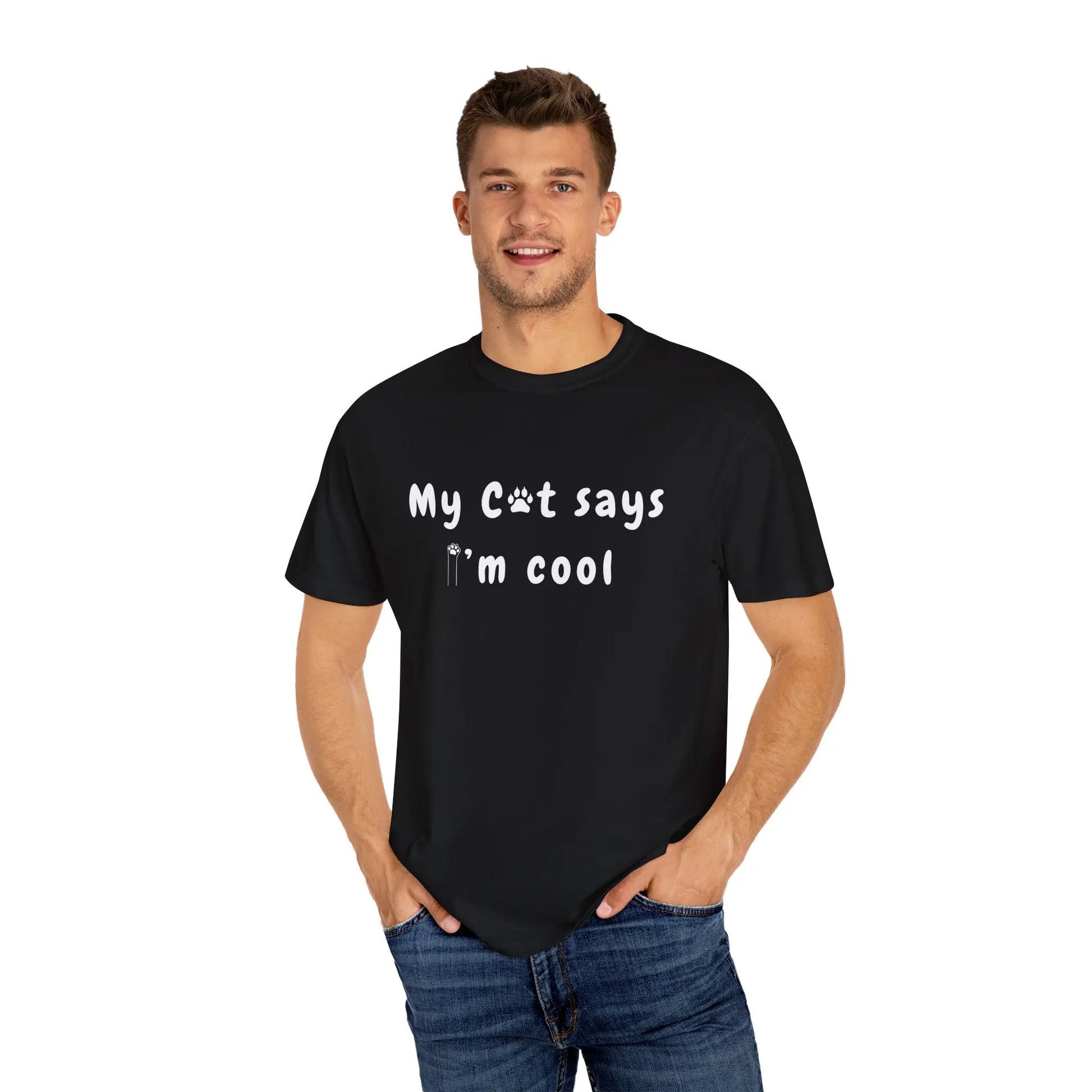 Black my cat says I'm cool shirt worn by smiling man with hands in pockets