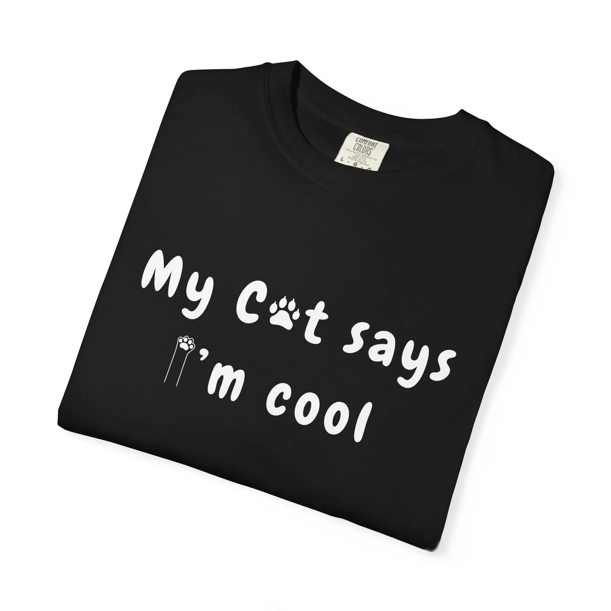 Black Teerio t-shirt with white text saying my cat says I'm cool shirt and cat paw print design