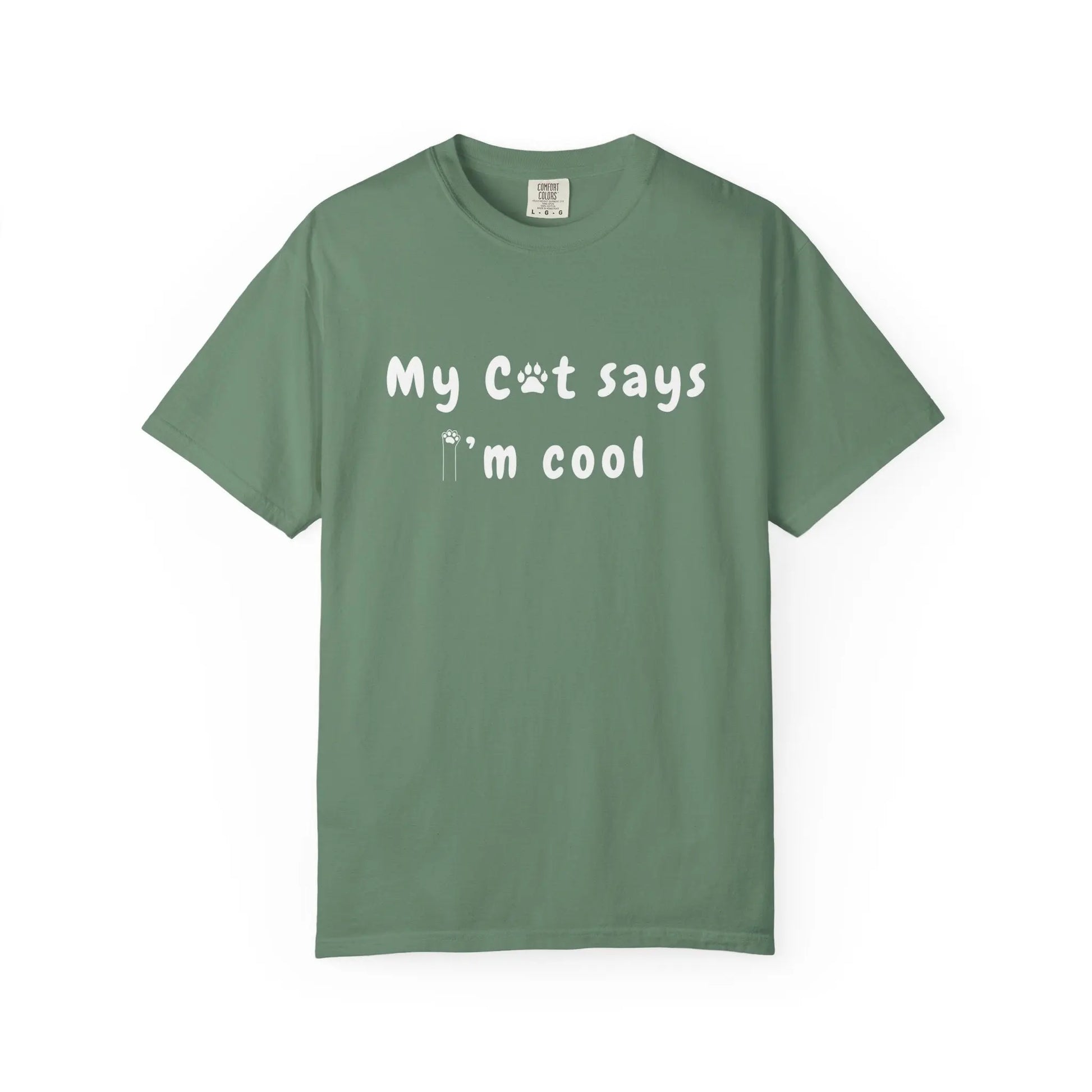 Green Teerio T-shirt with white text saying my cat says I'm cool shirt with paw print design
